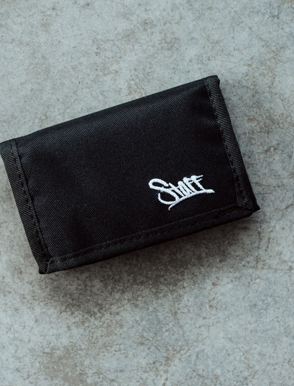 Portmonetka Staff black logo