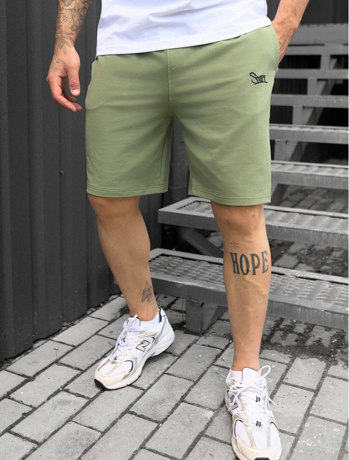 Spodenki Staff green logo