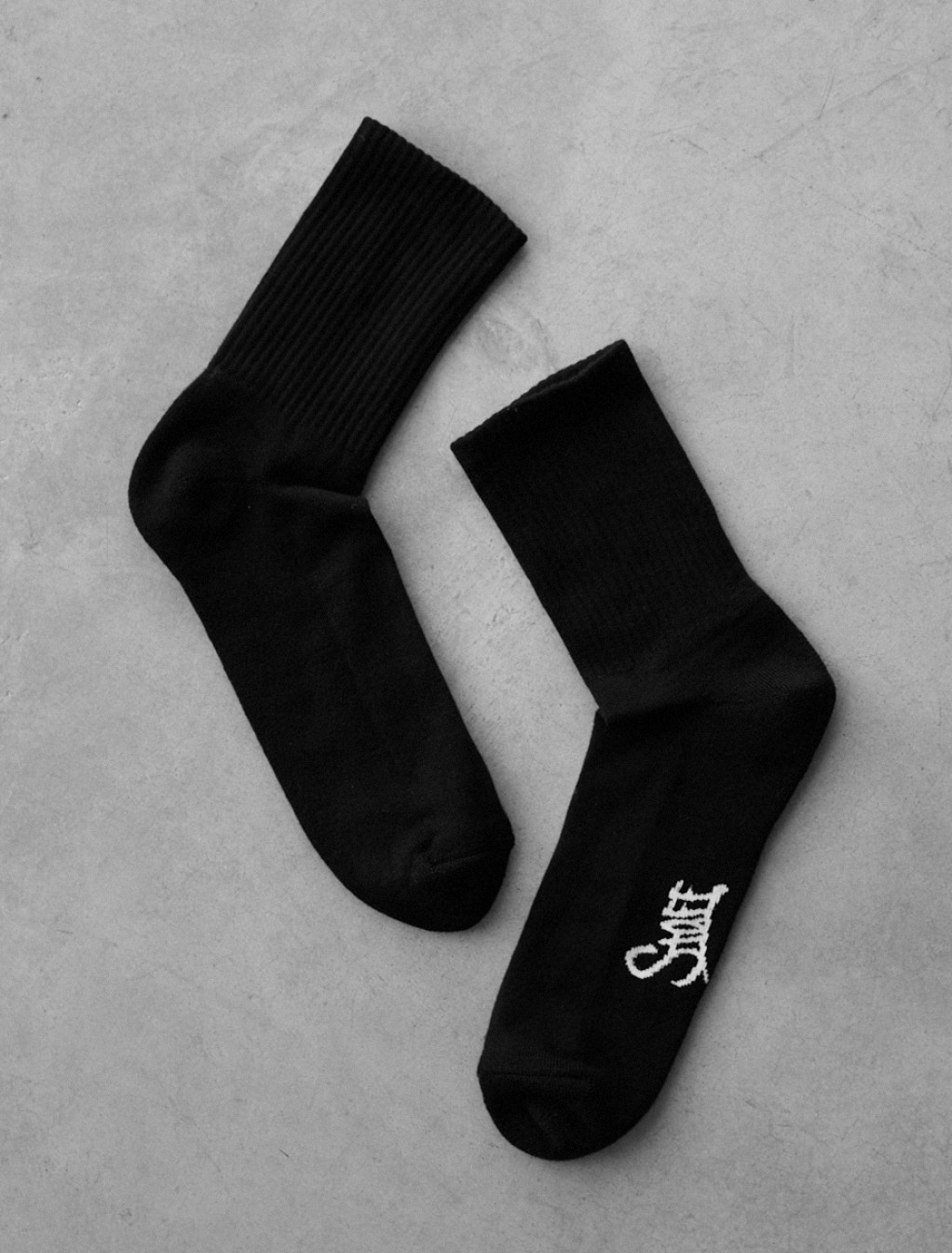 Skarpety Staff black logo