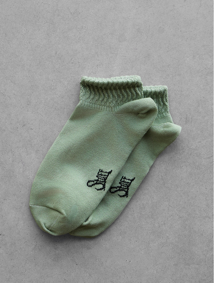 Skarpety Staff green logo