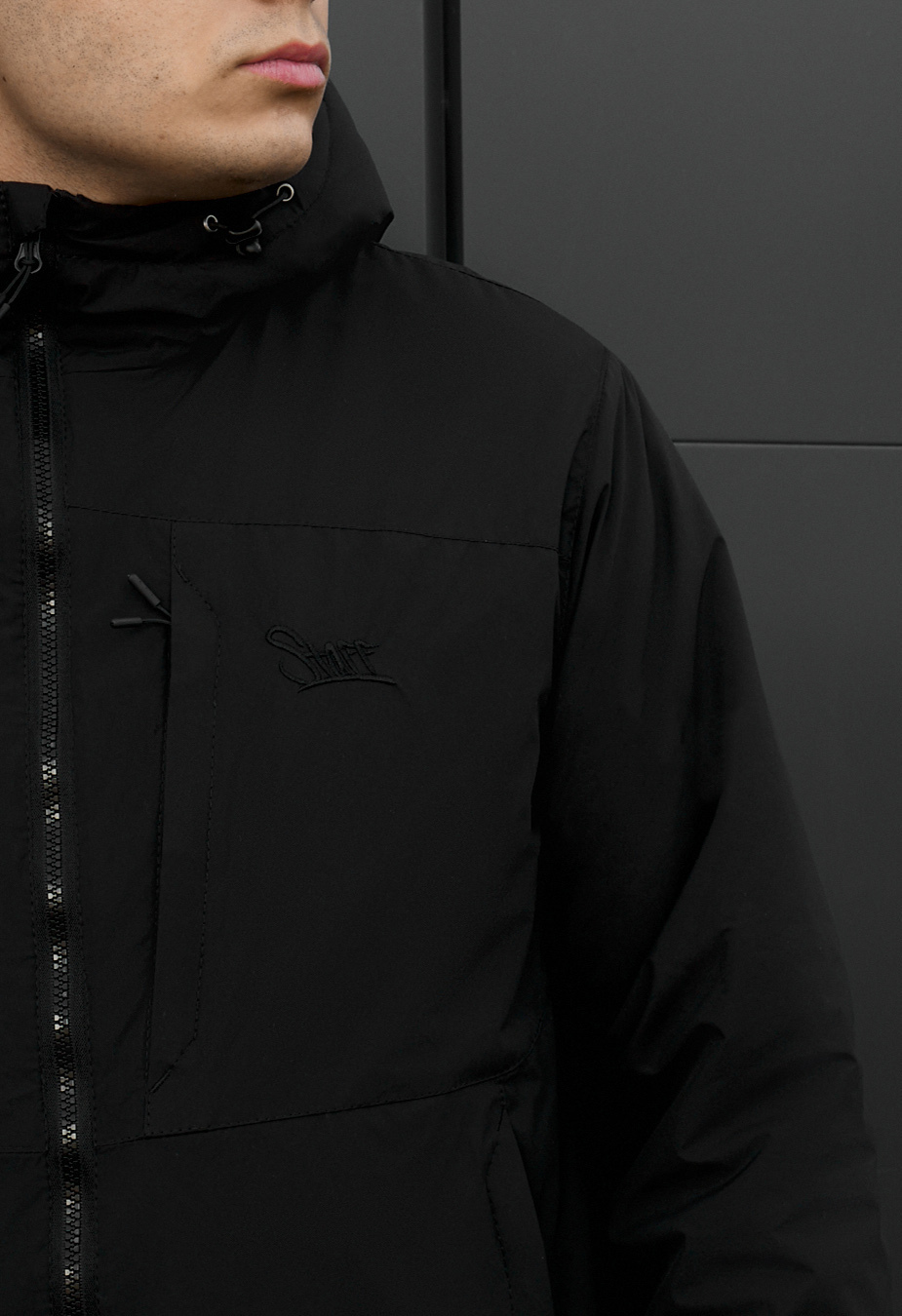 Kurtka Staff chap logo black