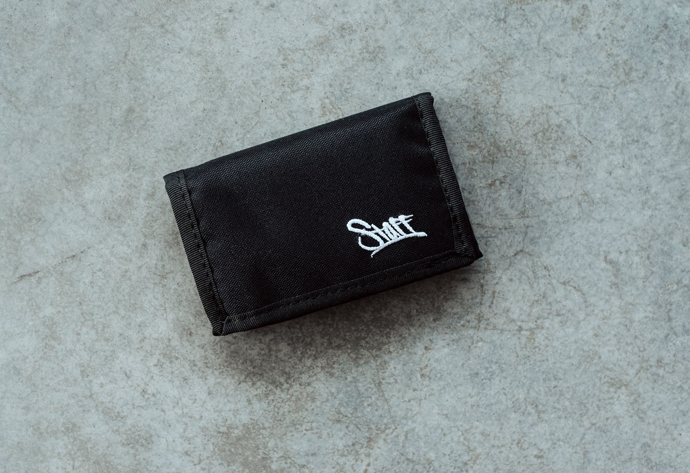 Portmonetka Staff black logo