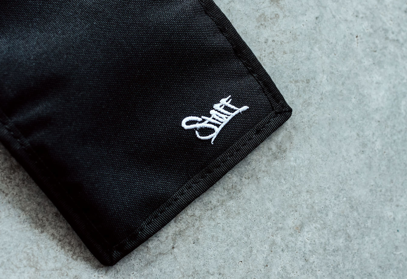 Portmonetka Staff black logo