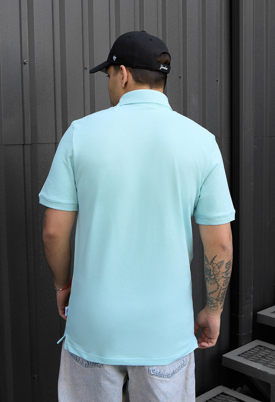 Polo Staff light blue logo