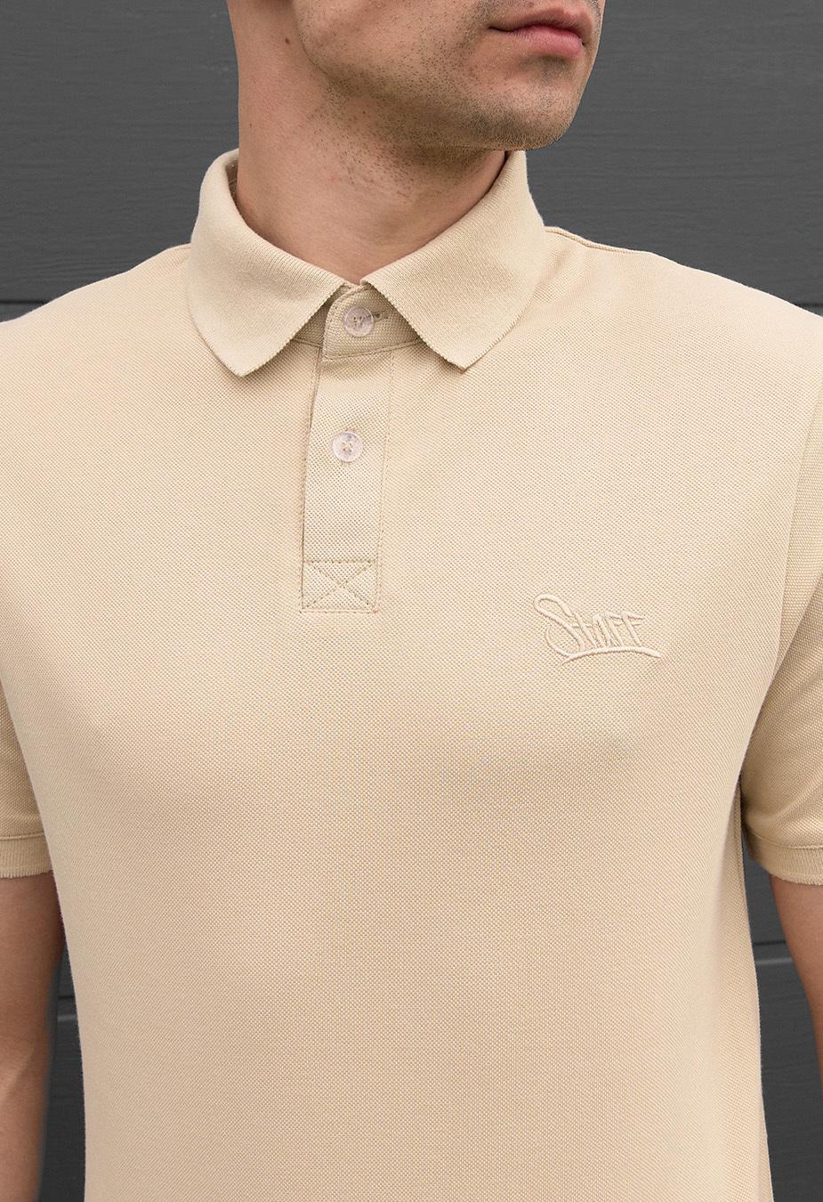 Polo Staff beige logo