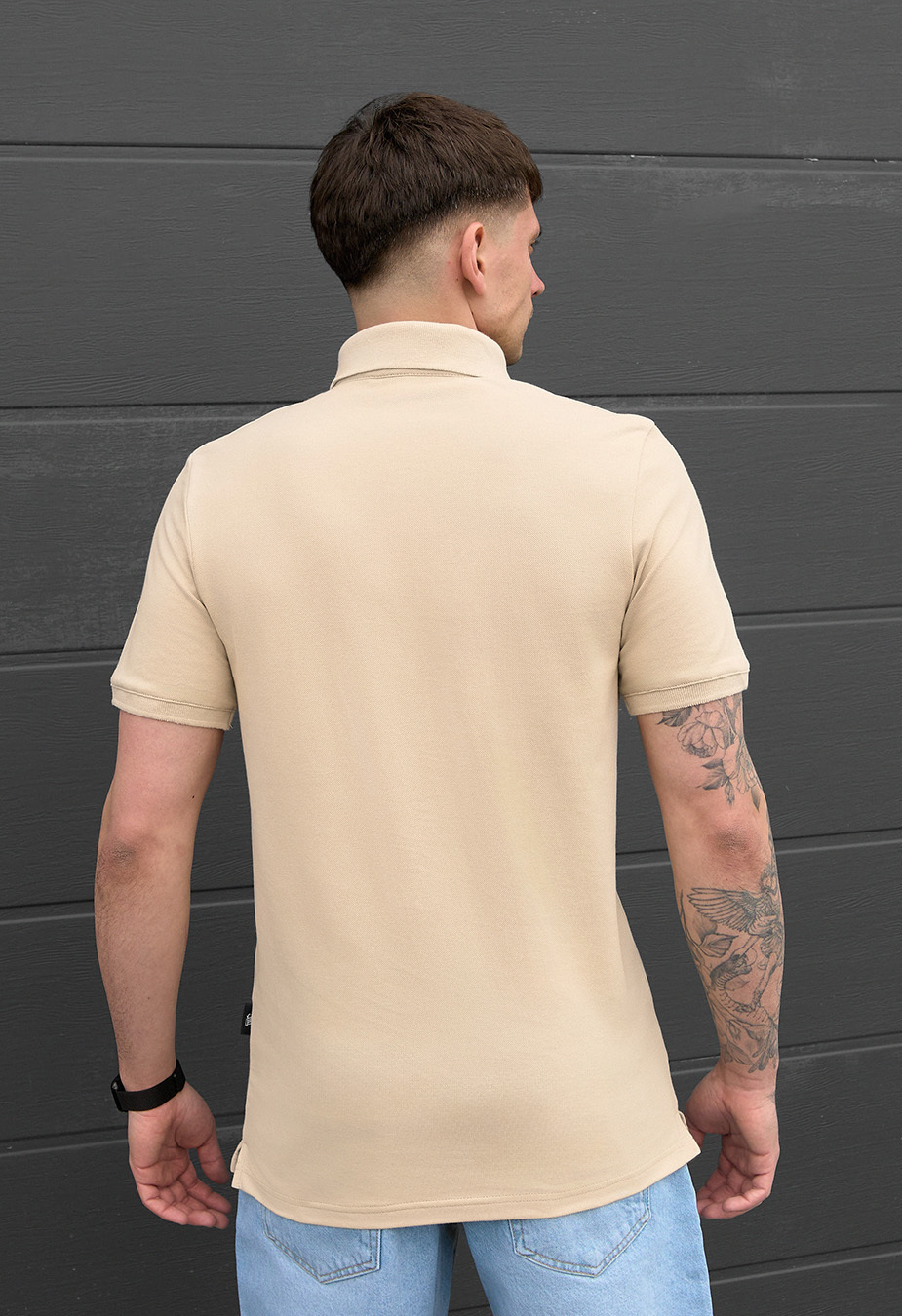 Polo Staff beige logo