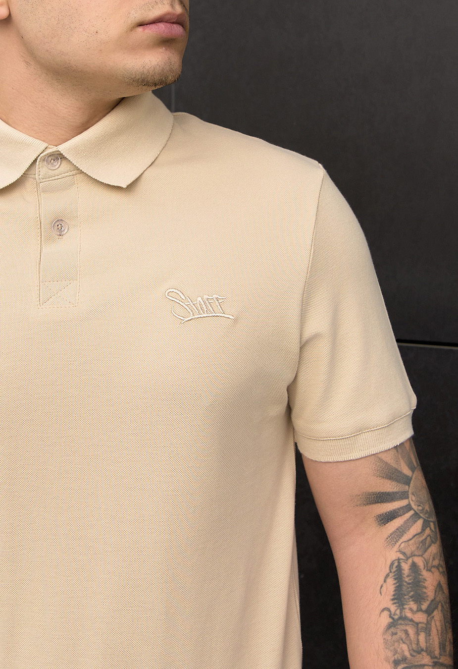 Polo Staff beige logo