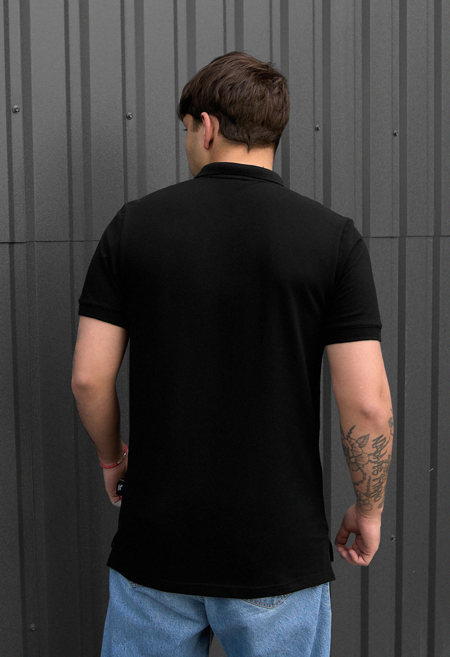 Polo Staff black logo