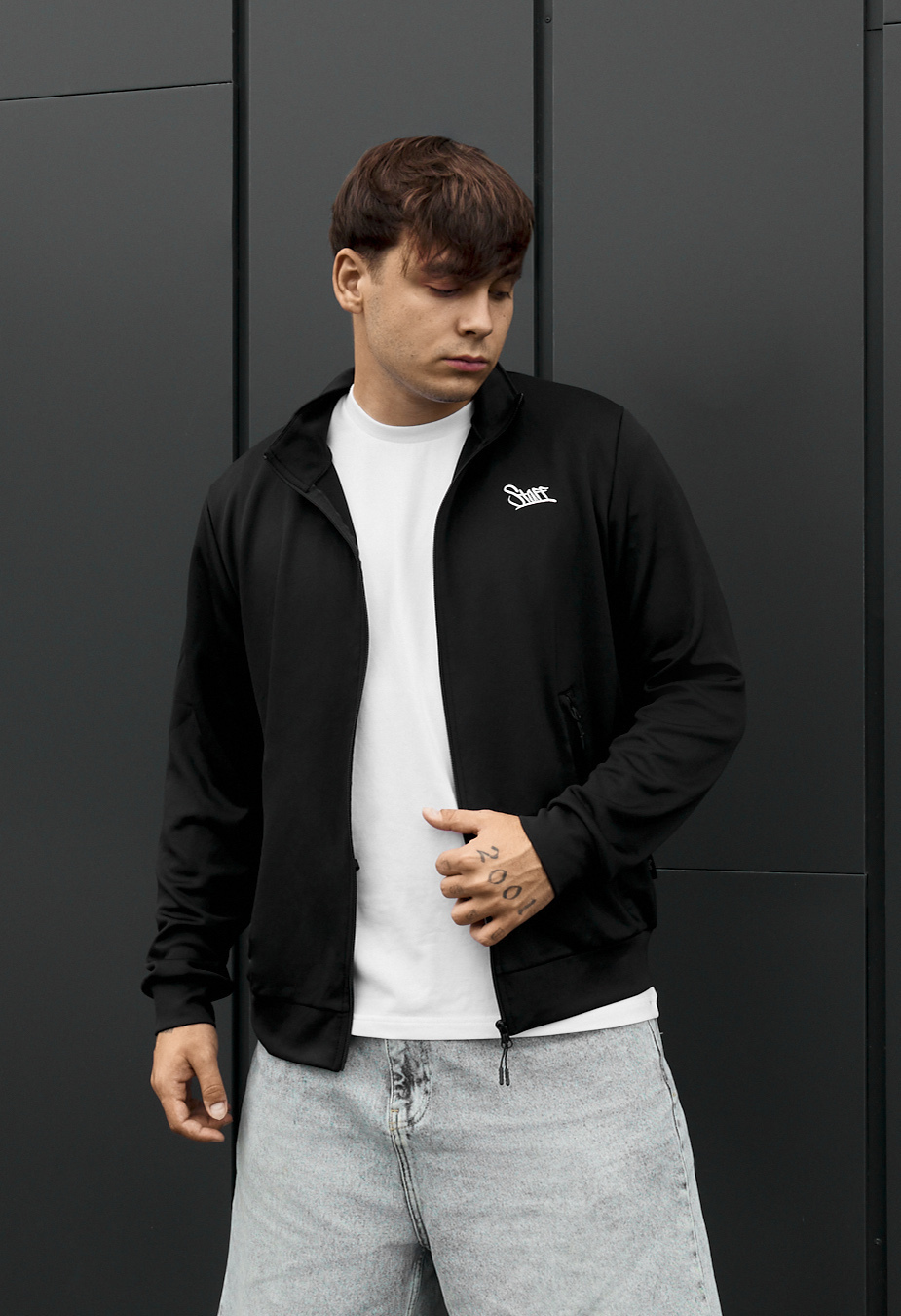 Olimpijka Staff ja logo black