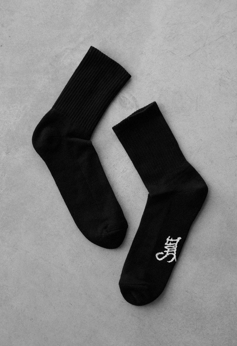 Skarpety Staff black logo